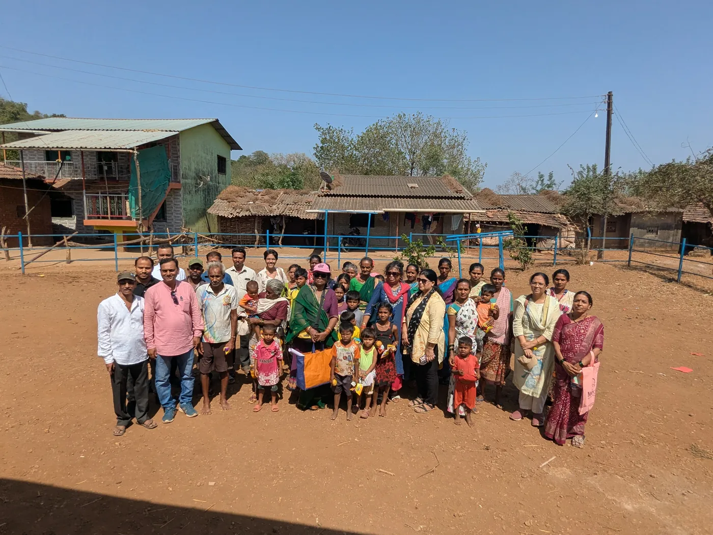 The HariKshama Foundation team with tribal families and children at Nifarwadi hamlet